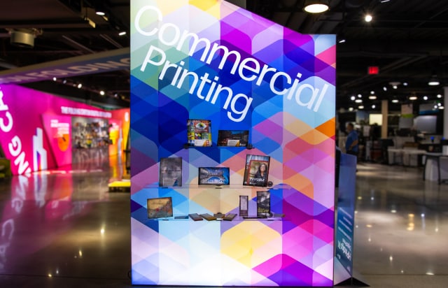 A sign of Commercial printing with a colorful background