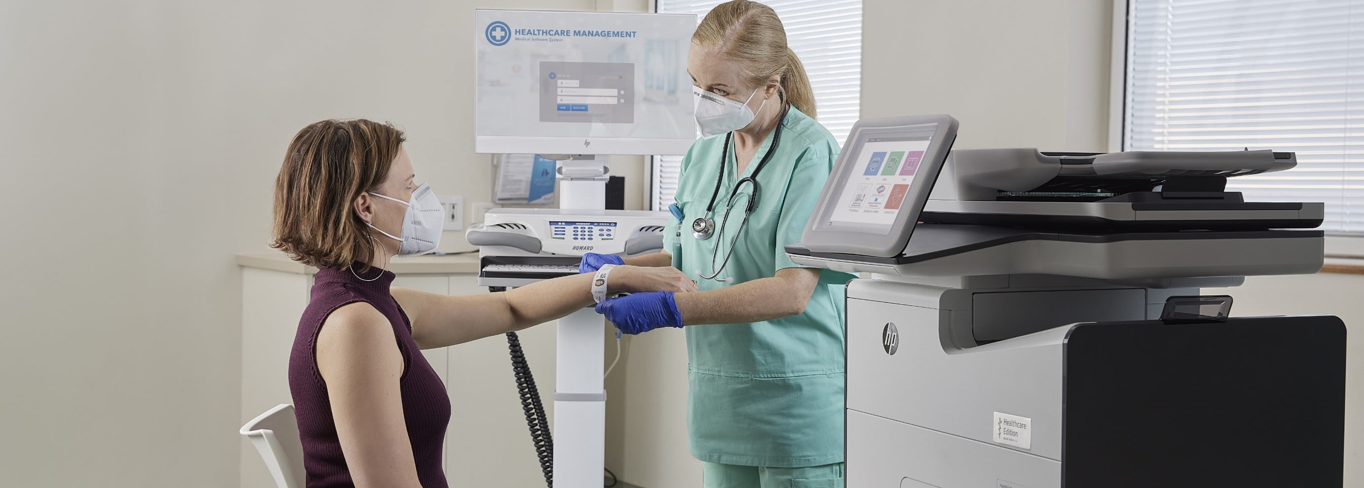 Nurse confirms patient id wristlet