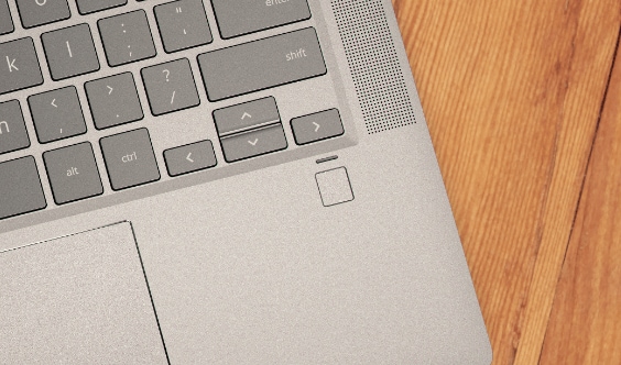 Close-up HP Chromebook keyboard showing fingerprint reader localization