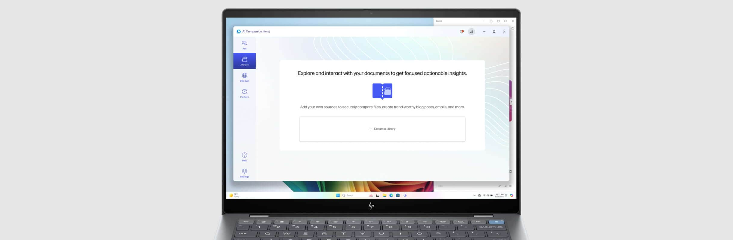 HP OmniBook laptop showing an HP AI Companion explore window on the screen