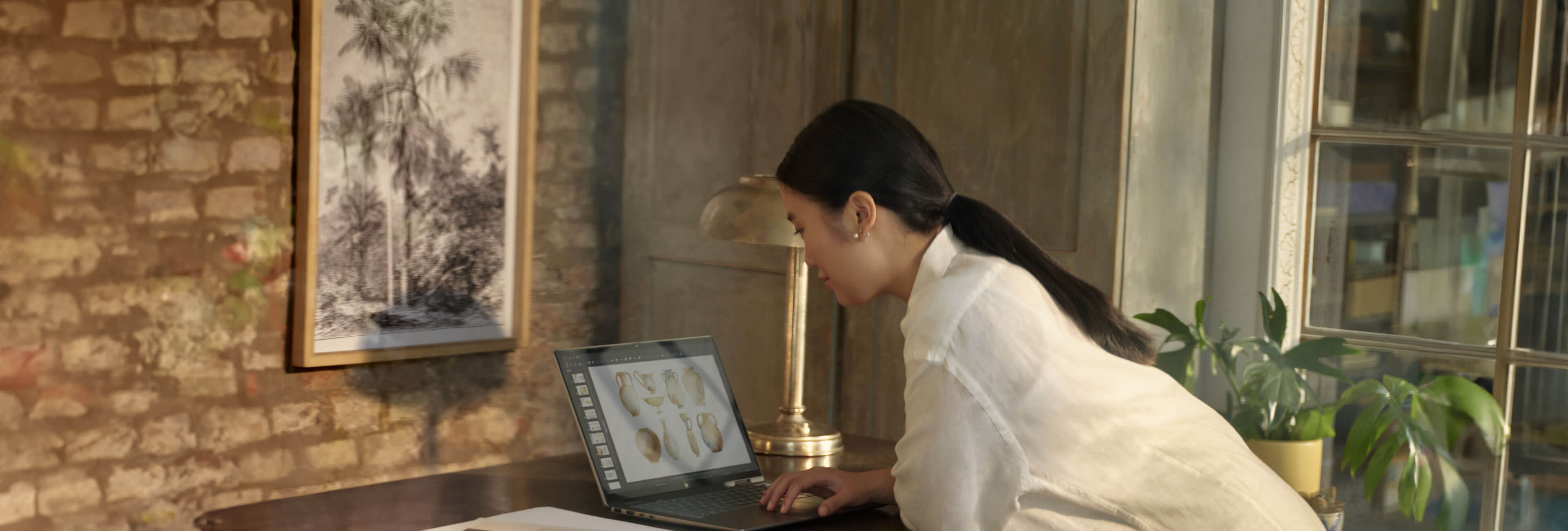 Women working on the Envy Laptop 