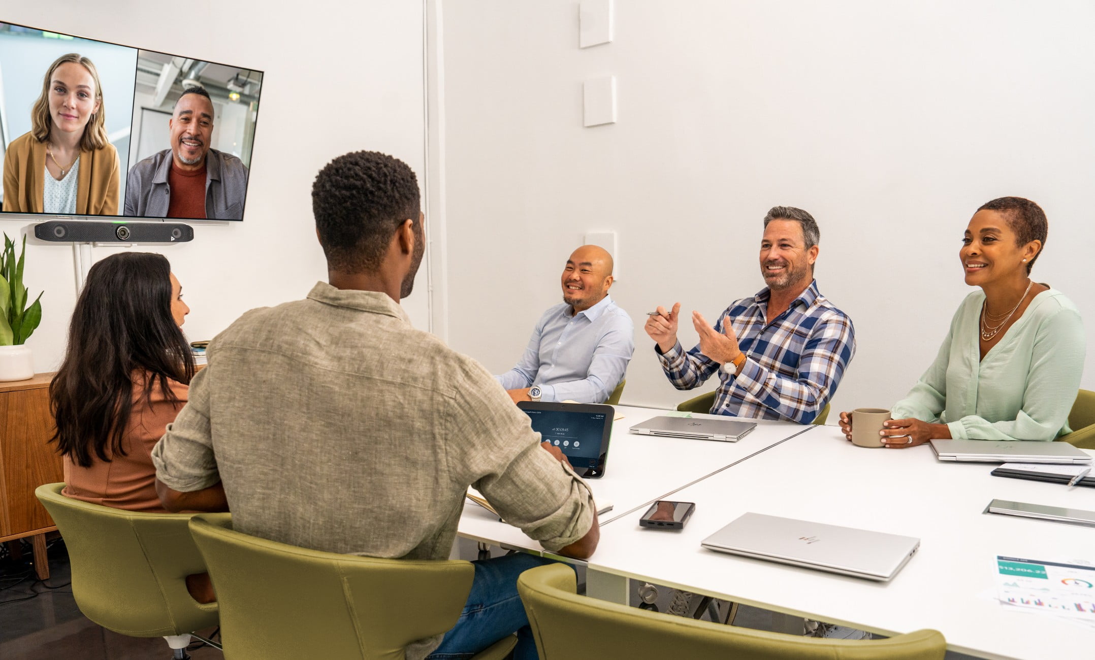 People in a video conferencing room