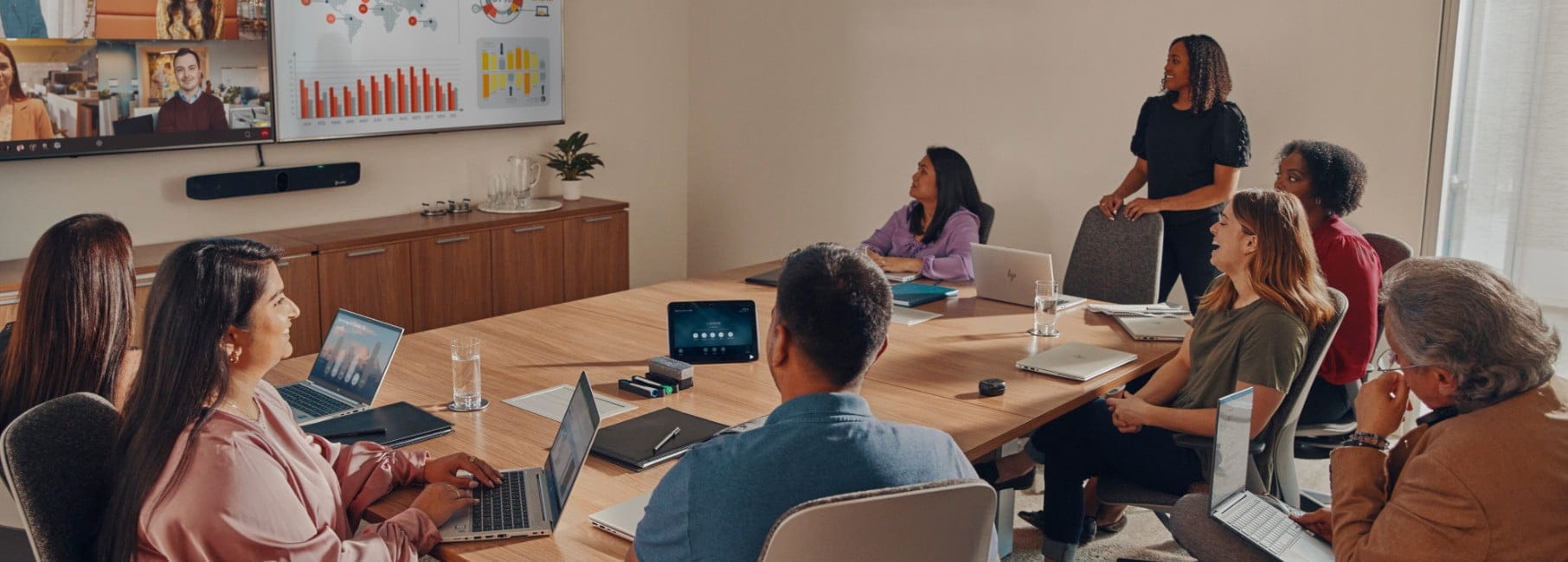 Group of people having a conference in a boardroom.	