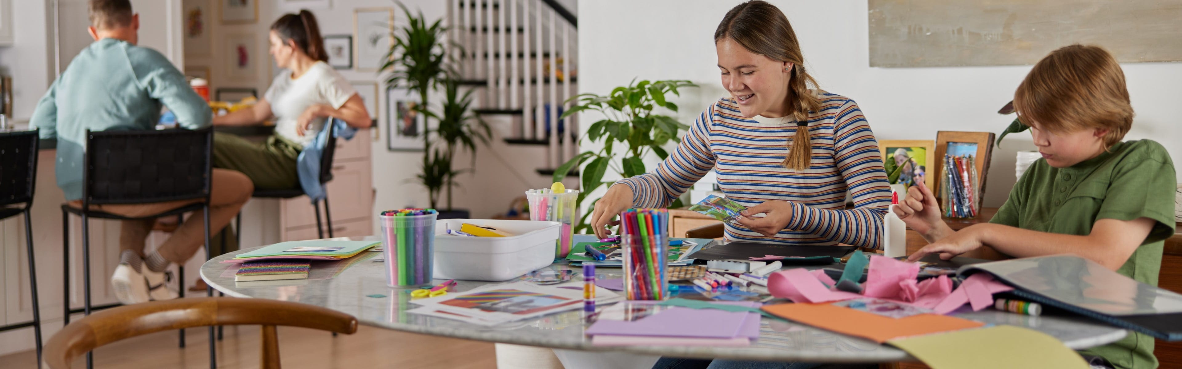 Children playing with printing papers 