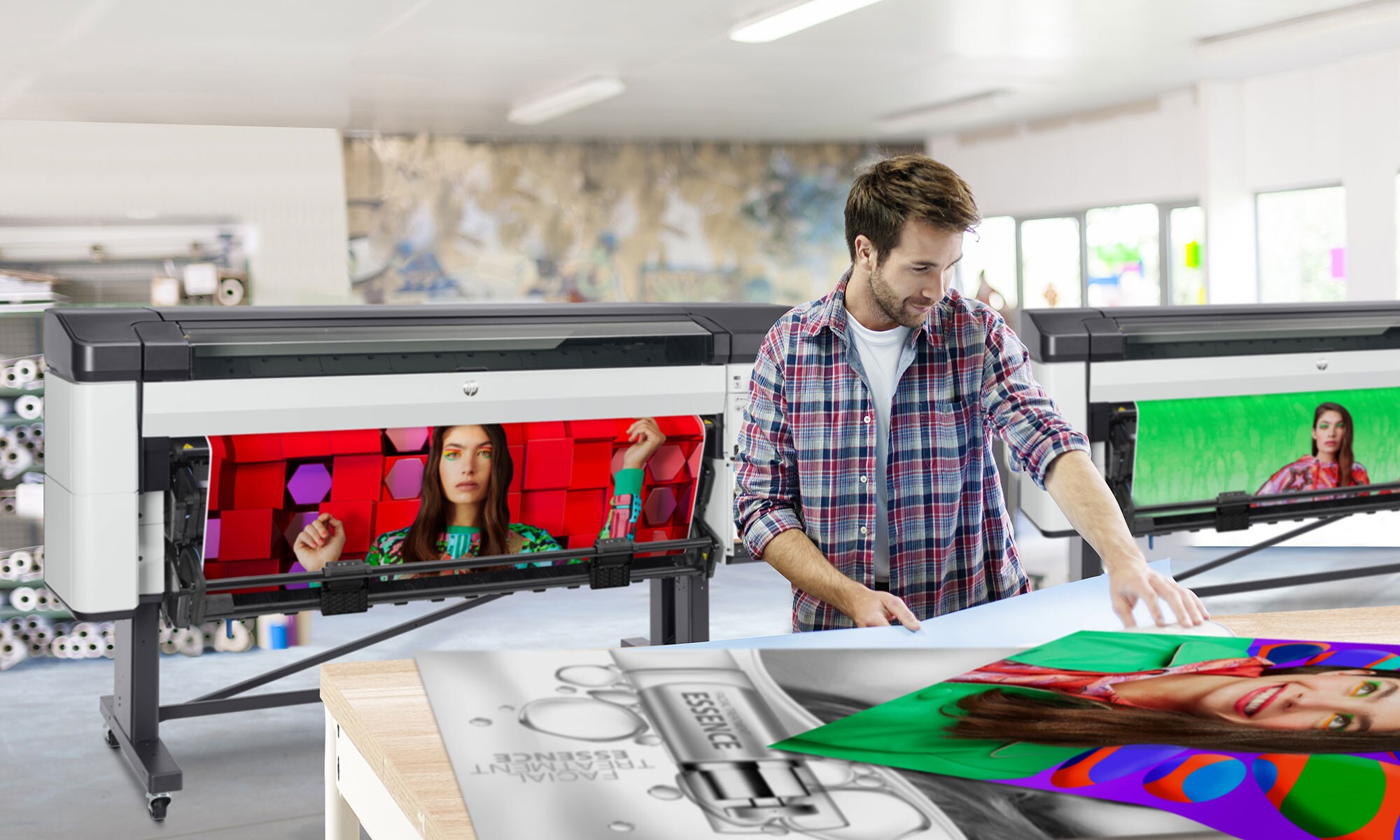 Person checking a printed media in front of the HP DesignJet Z9+ Pro printer in an office