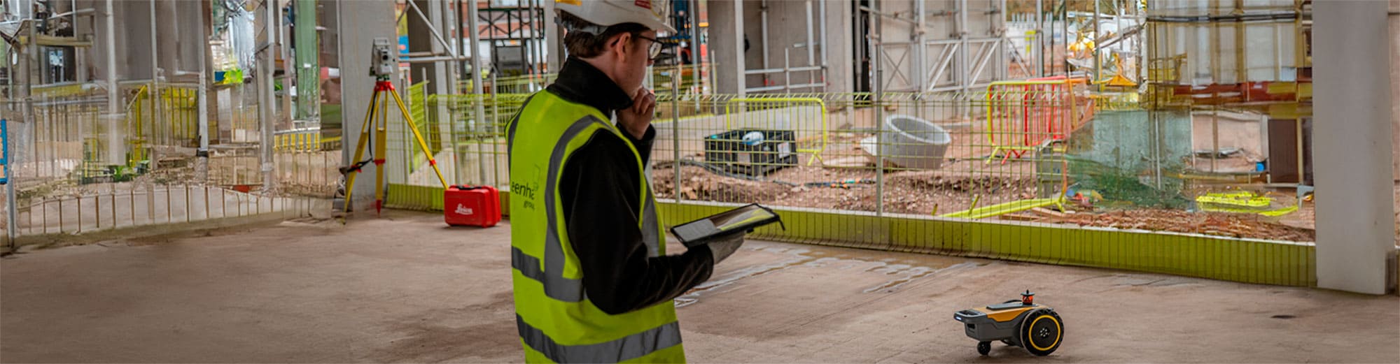 On-site engineer controlling the HP SitePrint robot from a tablet