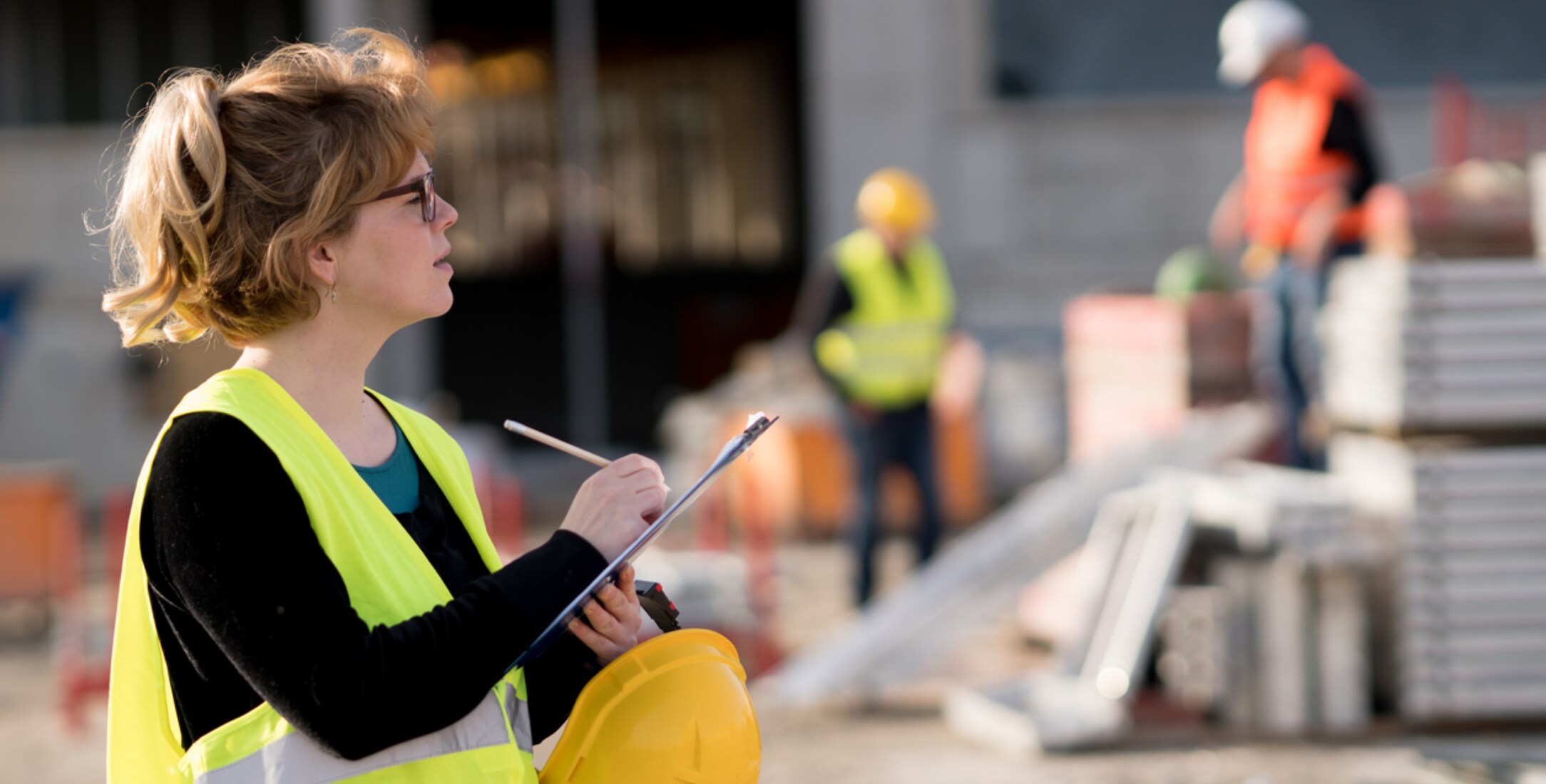 Site manager deciding how to analyze drywall construction costs in more detail