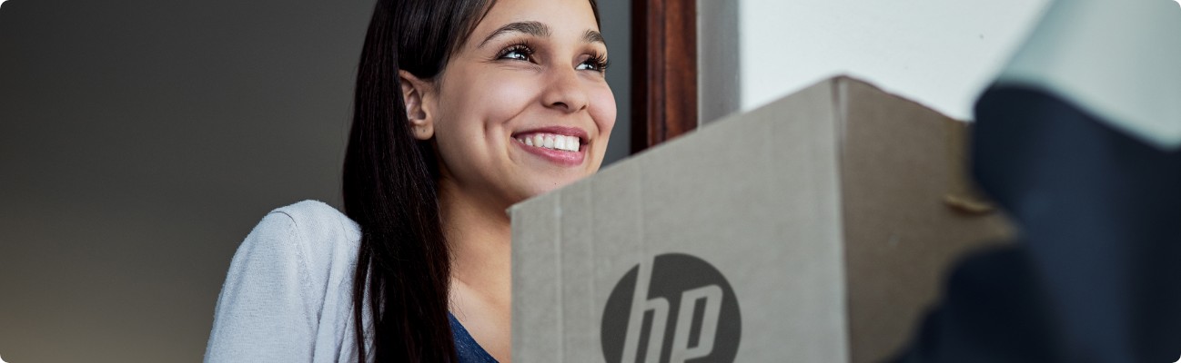 A woman receiving an HP package delivered to her house.