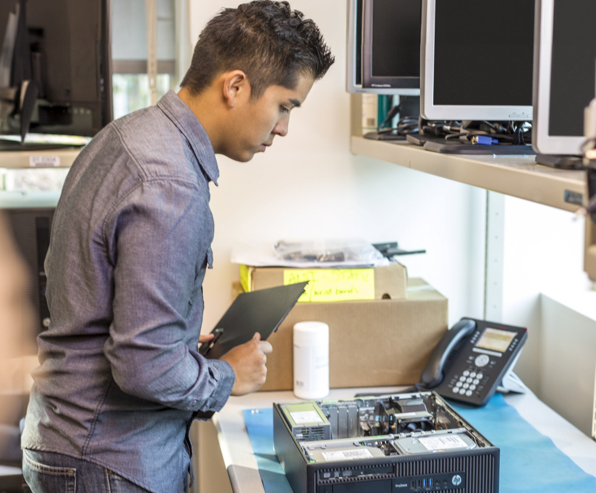 Worker building a computer