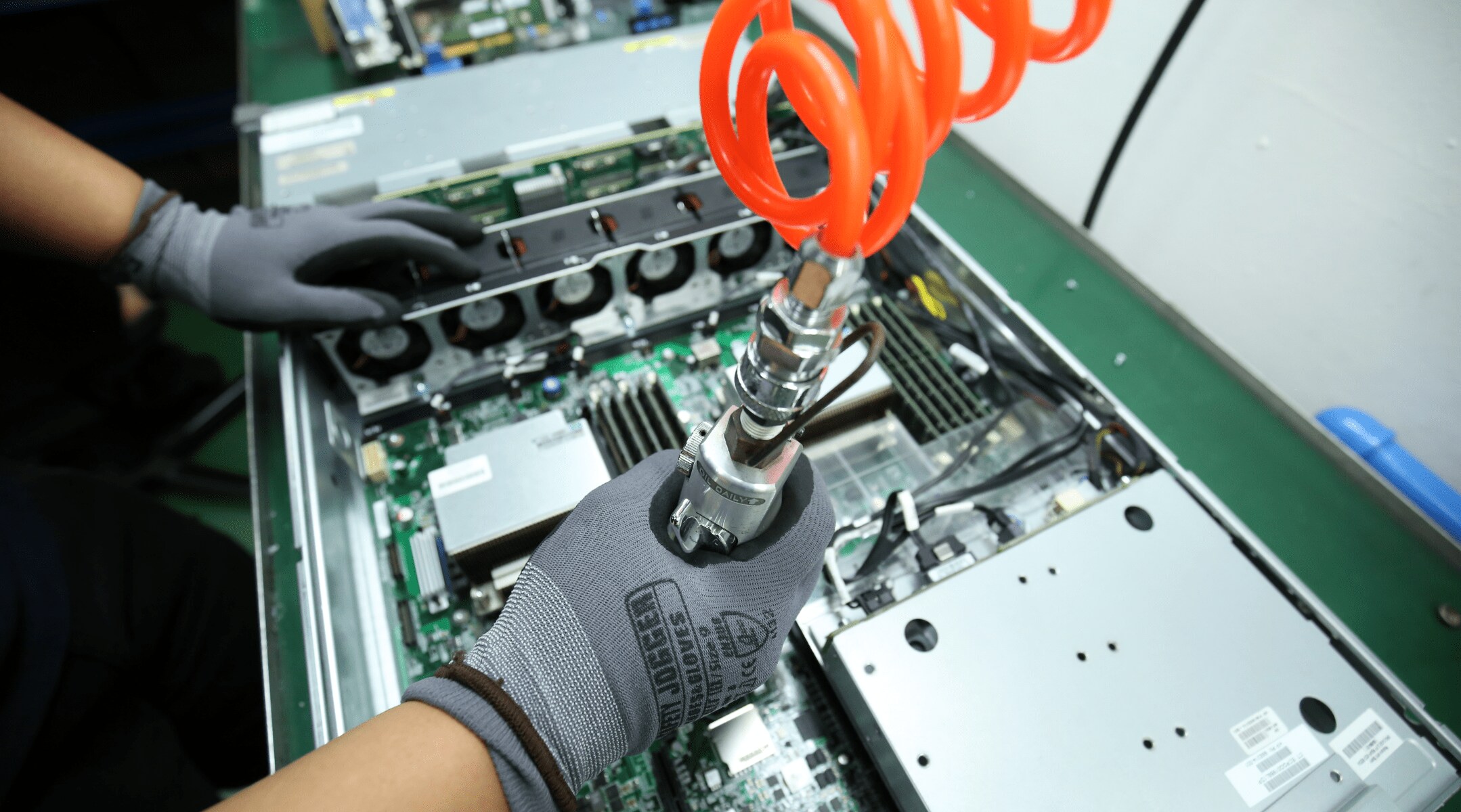 Worker building a computer