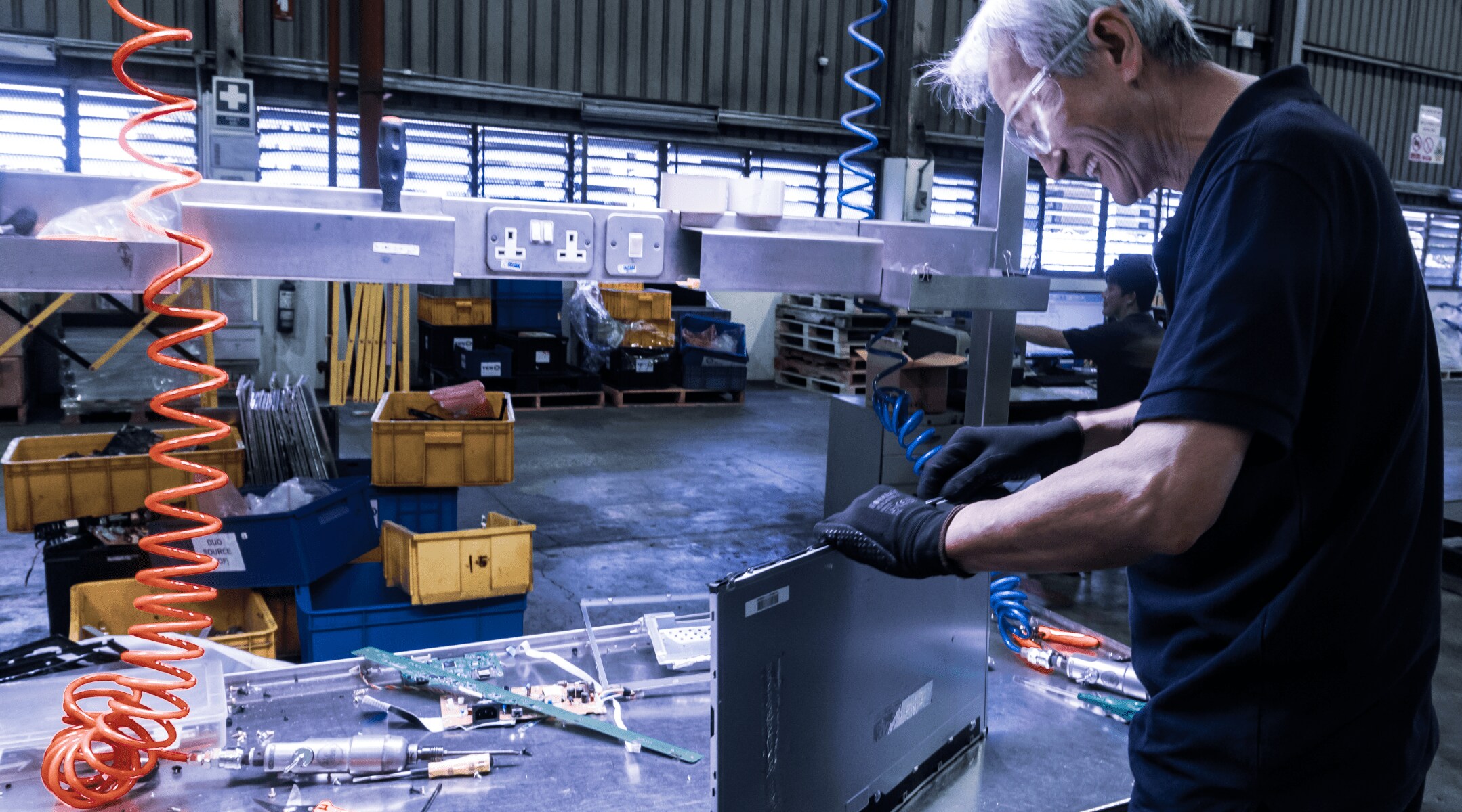 Worker building a computer