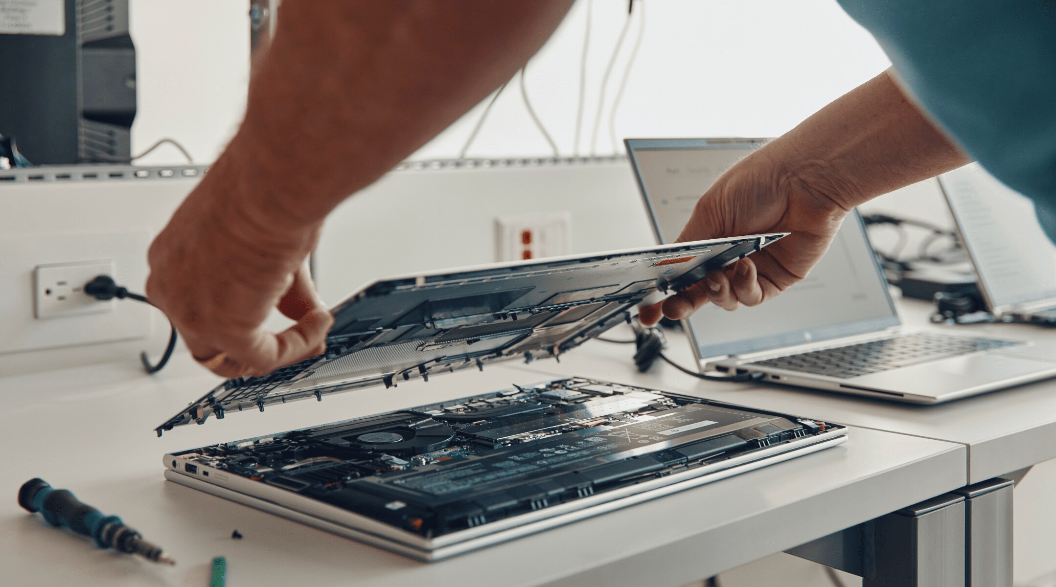 Worker building a computer