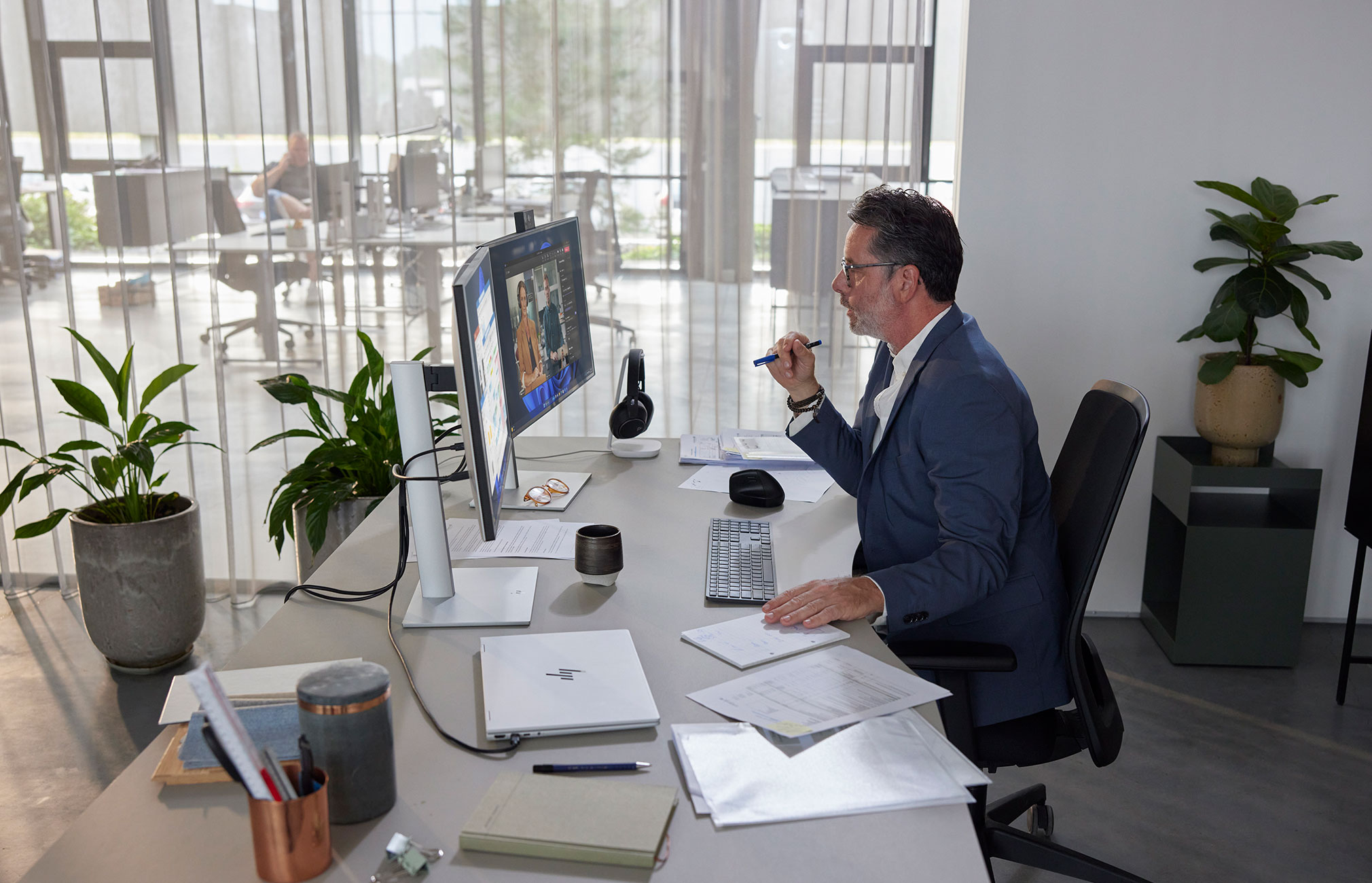 men working on a HP desktop