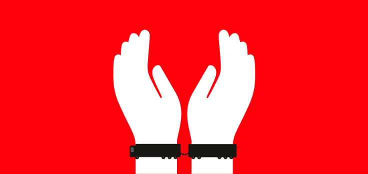 Drawing of two raised tied hands