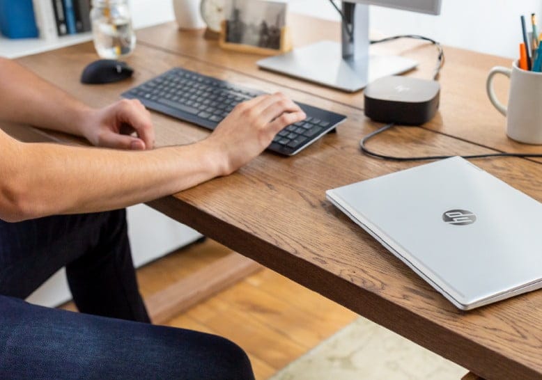 man typing on a keyboard