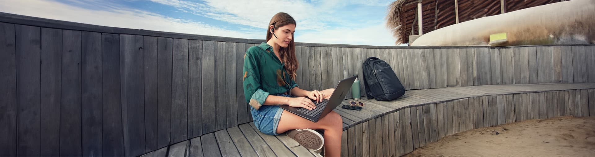 person attending meeting using a HP laptop