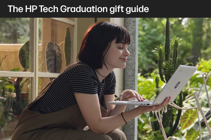 image of a grads with her laptop