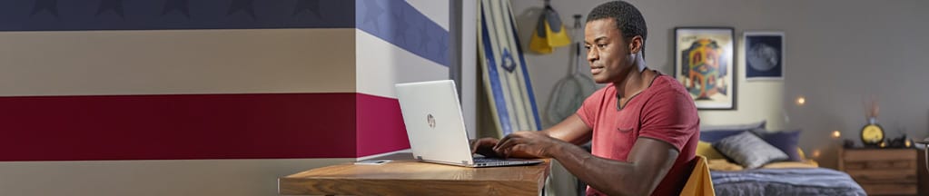 A man working with his laptop