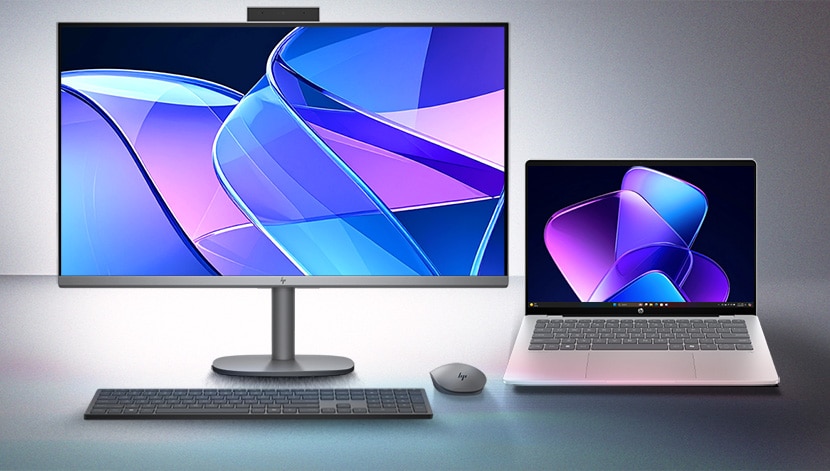 front view of AIO and laptop