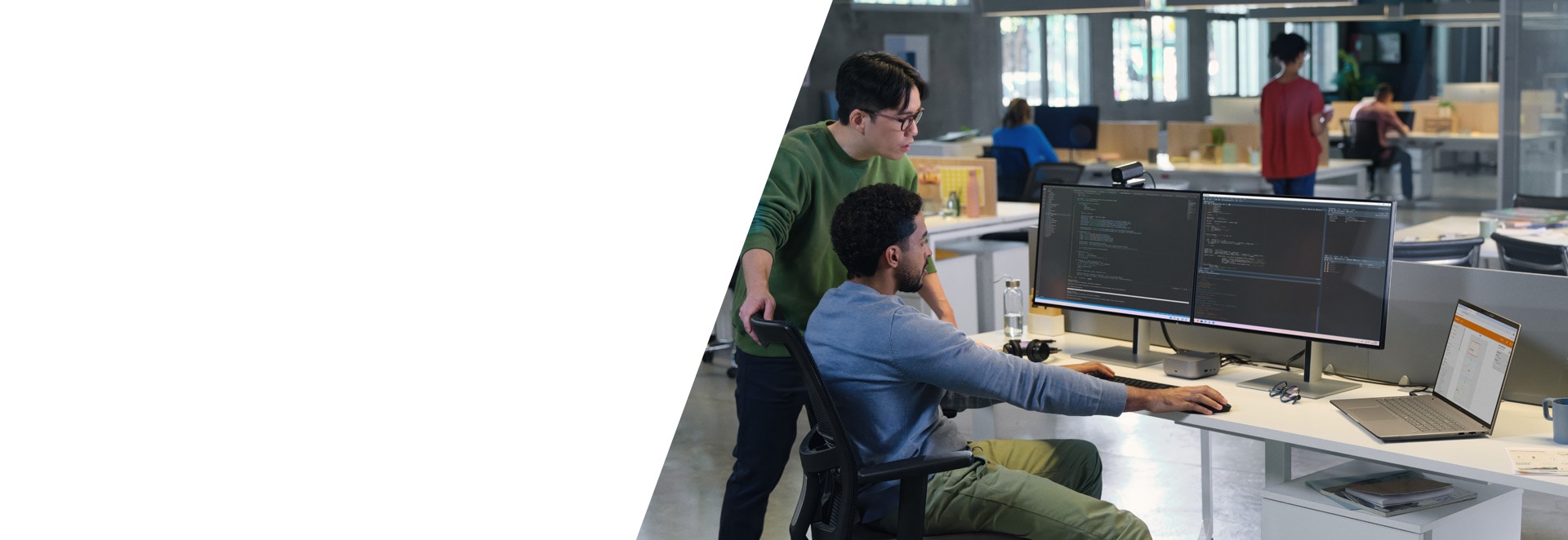 image of two men working collaboratelly in an office