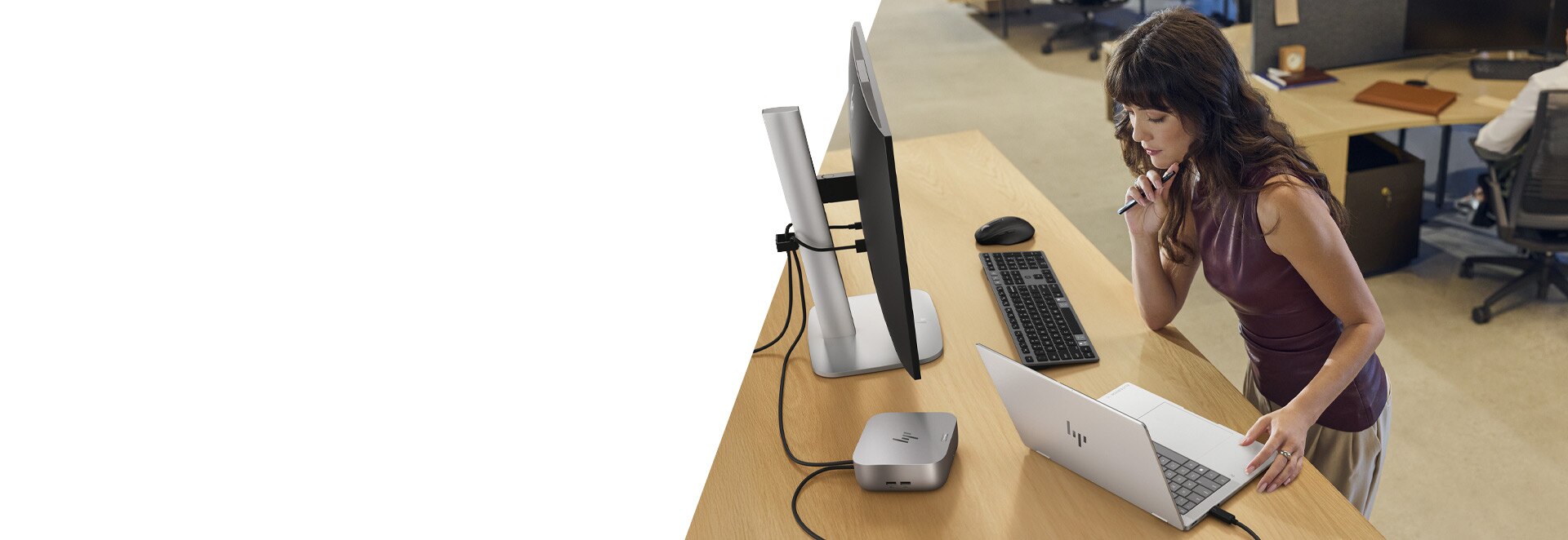 image of a girl working with PC setup equipped with docking